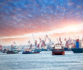 Industrial port cargo ships and cranes