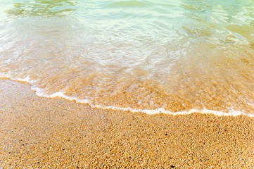 orange Sand beach and green wave