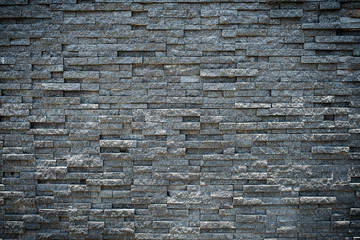 random black granite stone wall, grungy style