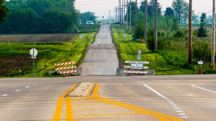 a closed country road in the early morning