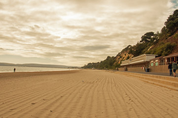 Fototapeta premium Evening sunshine on Bournemouth beach in Dorset, UK.