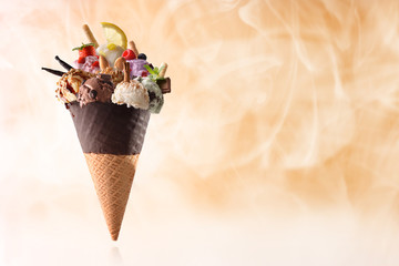Cone with assortment of natural fruit ice cream and steam
