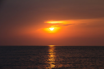 Fototapeta na wymiar The beautiful sunset view from Thai bay.