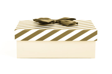 Pink gift box with a lid in a white and blue stripes and a blue satin bow. Toned