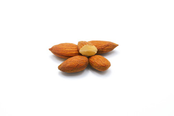 Group of roast almonds isolated on white background