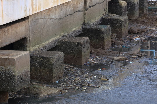 waste on dirty beach in bangpoo resort, samut prakan, Thailand