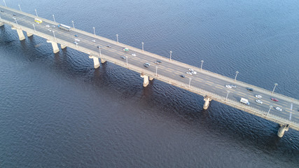 Aerial top view of bridge road automobile traffic of many cars, transportation concept
