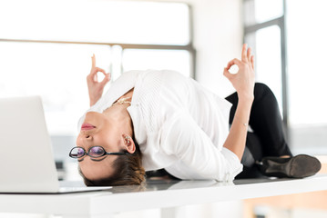 Serene woman reclining in apartment