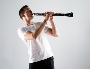 Man playing the flute © luismolinero