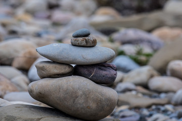 Fototapeta na wymiar Stones in a stack by the river