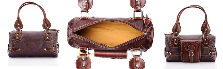 Leather ladies bag on a white background. Beautiful, fashionable, accessory, isolated. Interesting design, the texture of the skin. Comfortable handle.