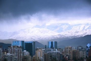 City view and snow falls in Santiago, Chile