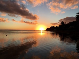 Beautiful sunset at the beach of Atimaono, Tahiti, French Polynesia