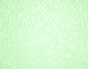 light bokeh circle on green background.