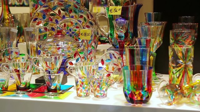 Venetian glass. Storefront with products of colored glass. Famous venetian colorful souvenir from murano glass