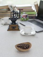natural coffee beans on a kitchen table. 