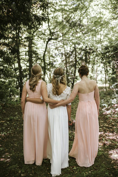 bride and bridesmaids from behind
