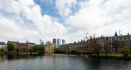 Binnenhof parliament and  Mauritshuis museum with modern skyscrapers and Hofvijver lake,  the Hague, Den Haag, Netherlands