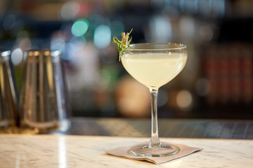 glass of cocktail at bar