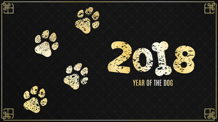 The year 2018 is a yellow earth dog. Golden traces in grunge style on a black background with a pattern. Chinese New Year. Vector illustration