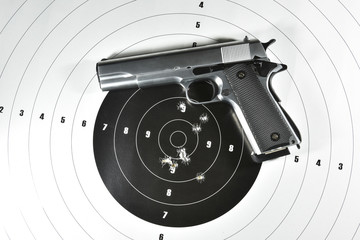 handgun and shooting target