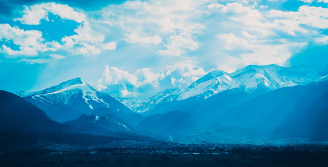 Cloudy evening in Mountains Pirin, Bulgaria. Winter. View from Bansko city. Europe, Rila, Balkans.