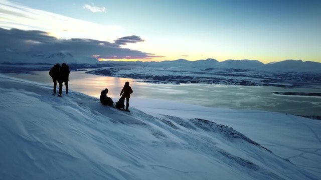Two people in the landscape of tromso