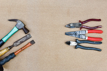 a various hand tools on wooden background