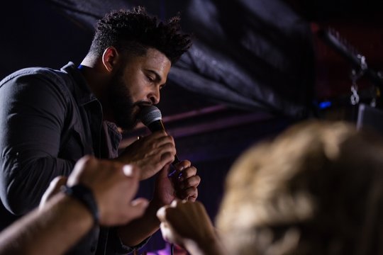 Singer performing on stage