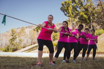 Group of women playing tug of war 