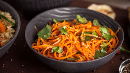 Asian korean carrot salad with spices in the ?lay plate