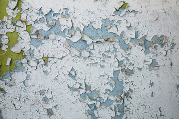 Obraz premium wite and blue peeling paint on aged concrete wall texture