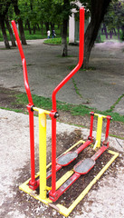 Fototapeta na wymiar Exercise equipment in the public park.