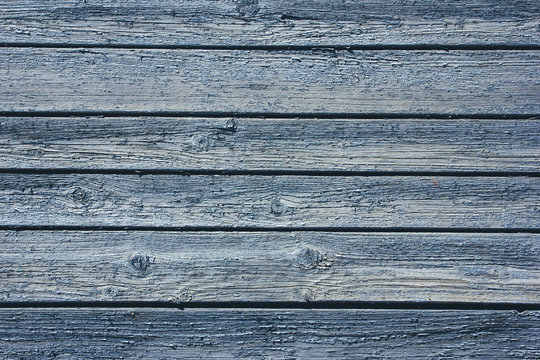 Blue wooden desks peeling paint pattern texture.