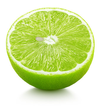 Ripe half of green lime citrus fruit isolated on white background
