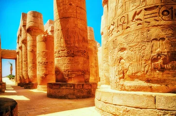 Foto auf Acrylglas Ägypten Travel in Egypt. Great Hypostyle Hall and clouds at the Temples of Karnak (ancient Thebes). Luxor, Egypt