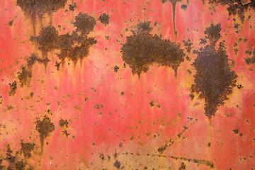red withered paint on rusty metal grunge texture