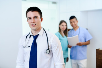 Fototapeta premium A Doctor posing - group of doctor residents