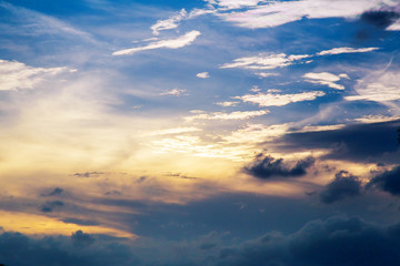 Fototapeta premium sunset clouds with sun setting down