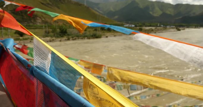 4k prayer flag on lhasa river,tibet.