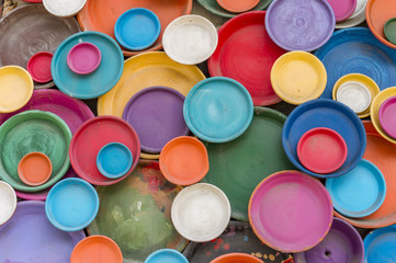 Colorful clay plates. Wall decoration.