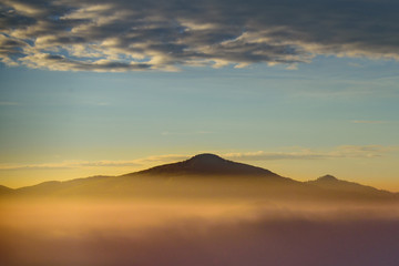 Amazing warm sun light above the forest valley of czech national park bohemian switzerland