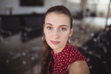 Portrait of confident businesswoman in office