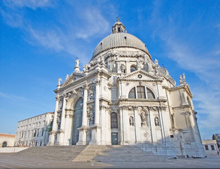Fototapeta na wymiar Closeup view: Basilica Santa Maria della Salute on embankment of Canal Grande in Venice, Italy