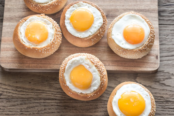 Egg-in-a-hole buns on the wooden board