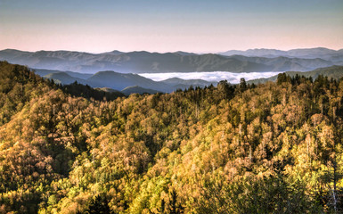 Smoky Mountain Mist. Mist rises from the valley of the Great Smoky Mountains National Park at the Newfound Gap Overlook on the border of North Carolina and Tennessee. Gatlinburg, Tennessee.