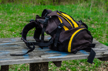 Backpack on wooden table