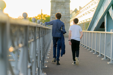 people kids walked andreevsky bridge in Moscow