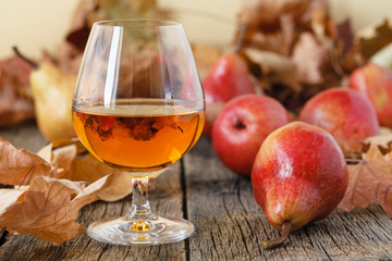 Sangria drink in glass on wooden background