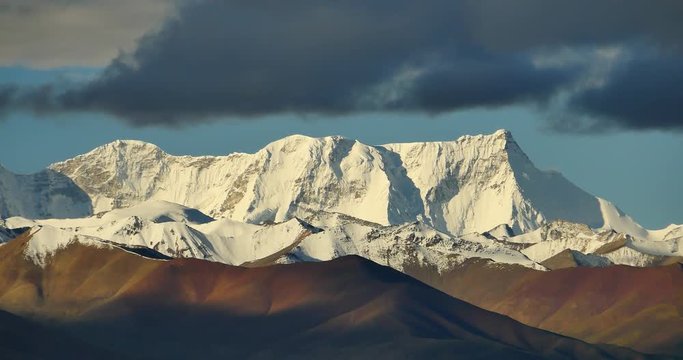 4k huge clouds mass rolling over lake namtso & Tanggula snow mountain peak,tibet mansarovar,Tibet's second largest lake,is the third largest saltwater lake in China.
